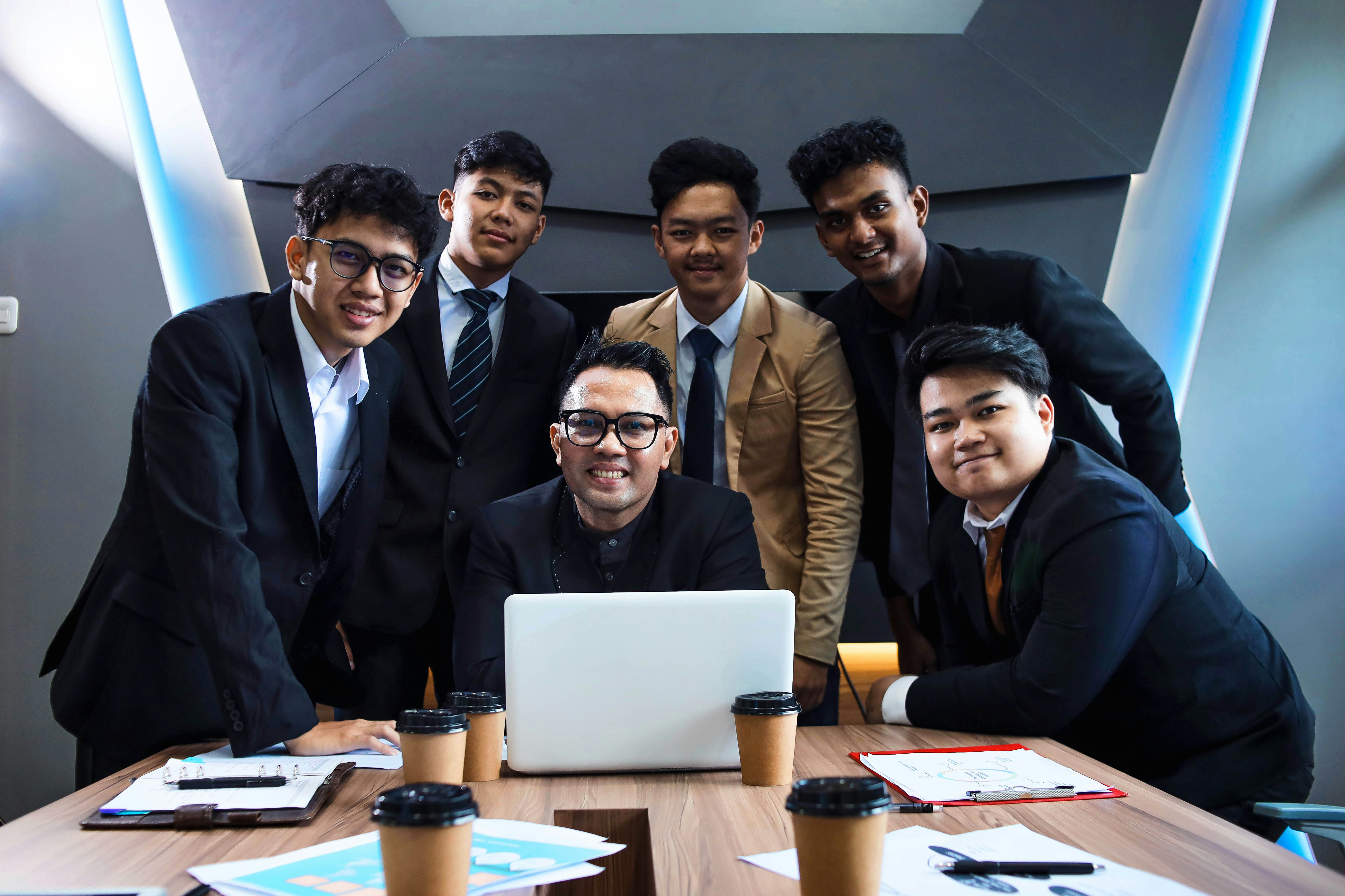 Legal and finance professionals reviewing compliance workflows