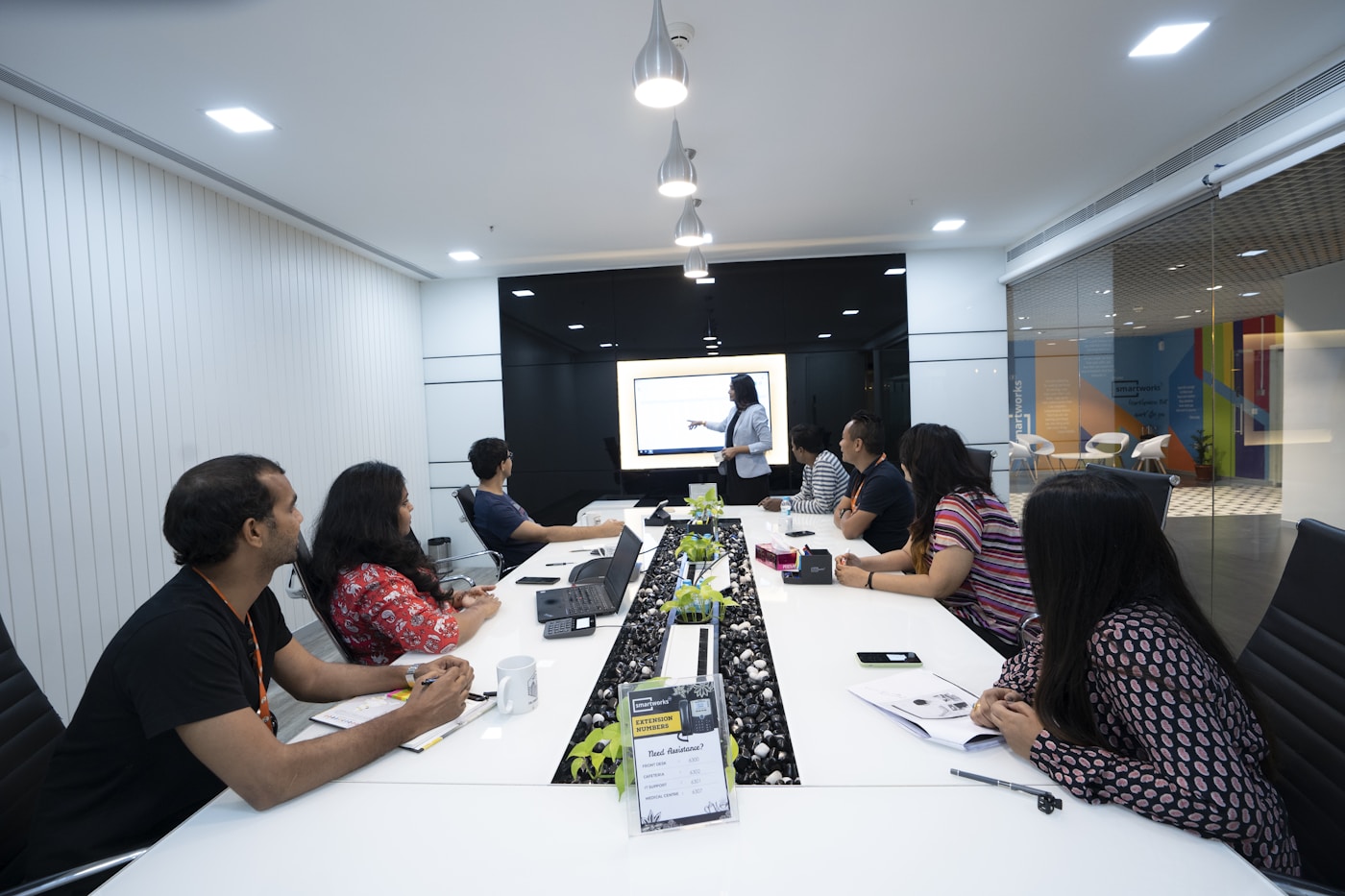 Technology delivery team reviewing engineering workflow